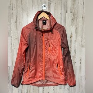 Nike windbreaker jacket with an orange and black‎ gradient pattern